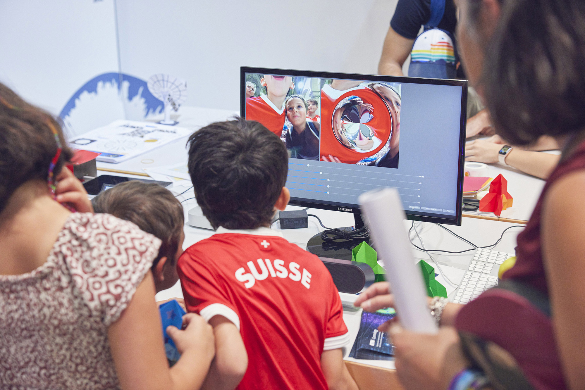 Children at the stand of the Cosmology Group