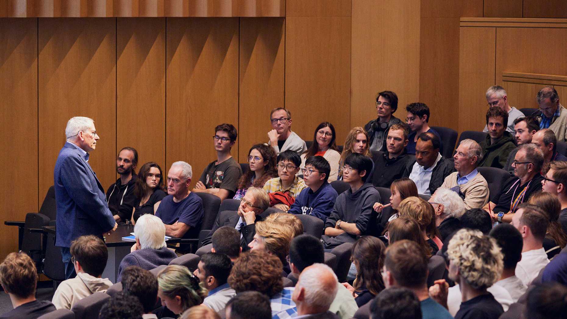 Speaker and audience in an auditorium