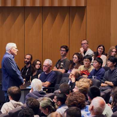 Speaker and audience in an auditorium