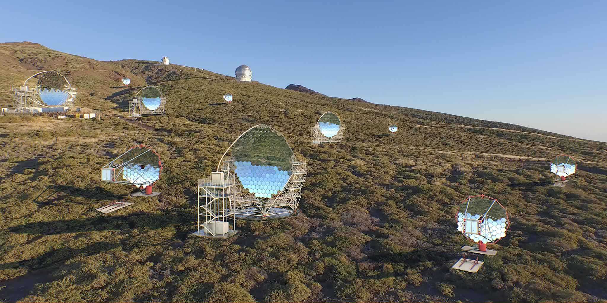 A hill dotted with telescope dishes on the island of La Palma