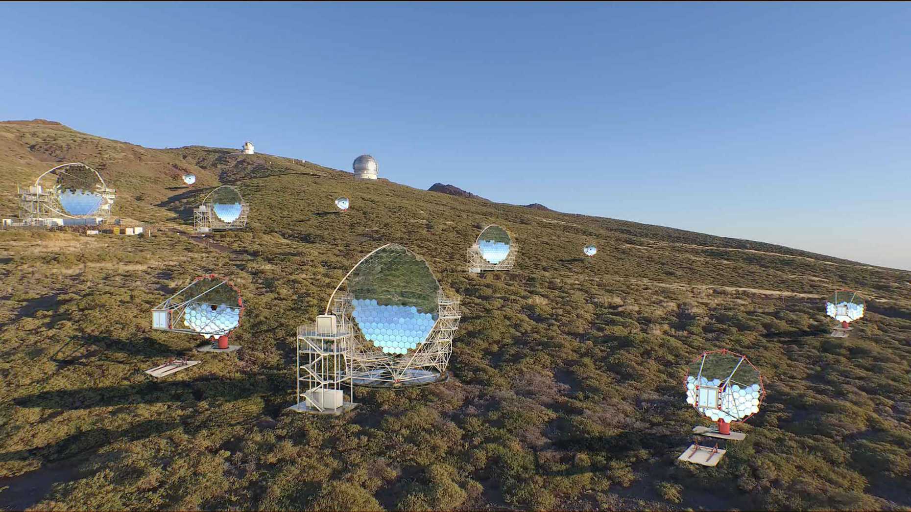 A hill dotted with telescope dishes on the island of La Palma